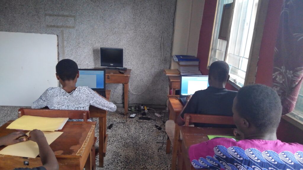 A picture of our blind beneficiaries receiving computer training.